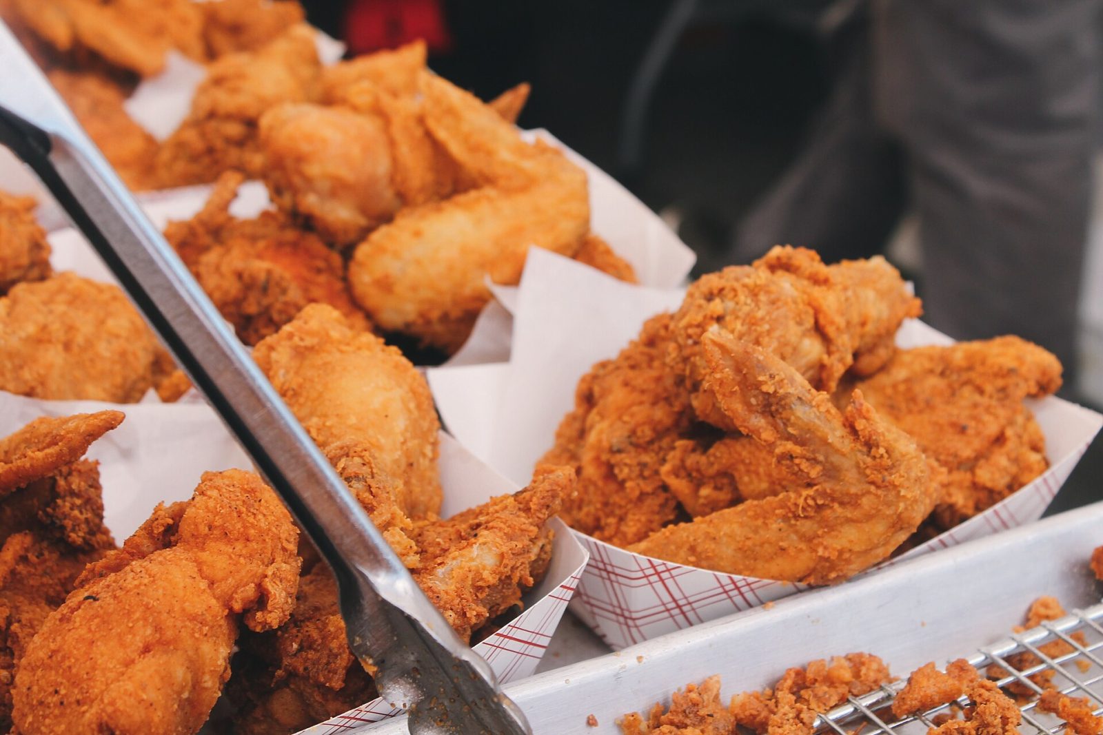 Placeholder image — fried chicken in red-check paper baskets, not photographed at Wouters' Front